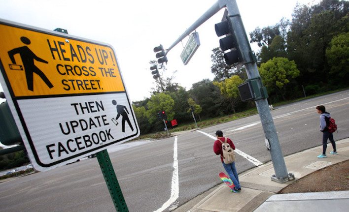CA Town Adds Facebook Warning To Road Signs