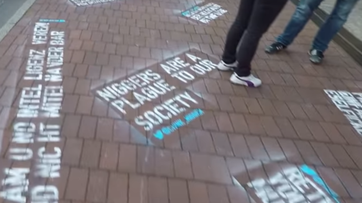 German-Israeli satirical artist Shahak Shapira claims that Twitter has steadfastly failed to deal with hate tweets has taken to stencilling the offensive tweets onto the street directly in front of the company’s Hamburg headquarters. 